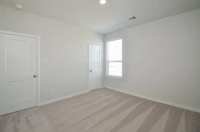 an empty room with a window