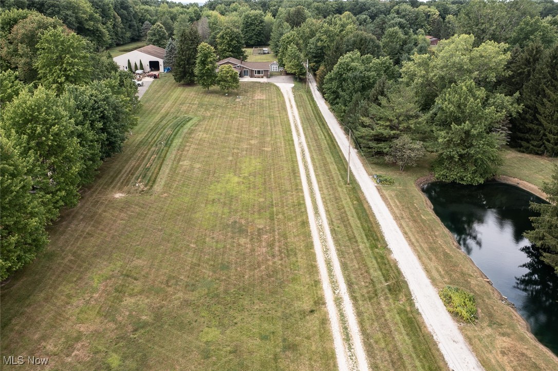 3434 Hamlin Road Medina, OH 44256 - Photo 2 of 37 Drone / aerial view featuring a driveway and a rural view