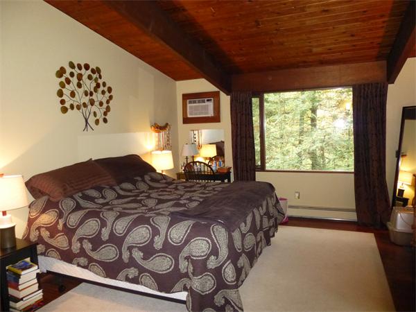 25 Belvedere Road Boxford, MA 01921 - Photo 11 of 16 a bedroom with a bed mirror and window