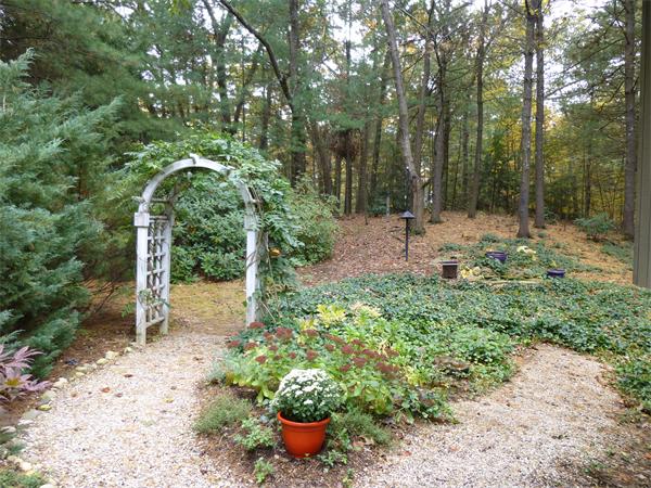 25 Belvedere Road Boxford, MA 01921 - Photo 15 of 16 a view of a garden with a tree