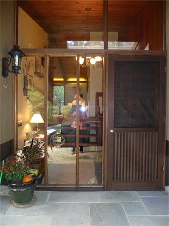 25 Belvedere Road Boxford, MA 01921 - Photo 2 of 16 a view of a porch with dining table and chairs