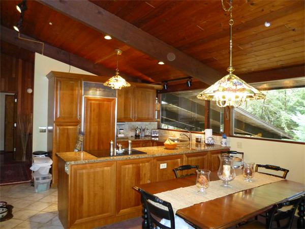 25 Belvedere Road Boxford, MA 01921 - Photo 5 of 16 a room with lots of tables a chandelier and pool table