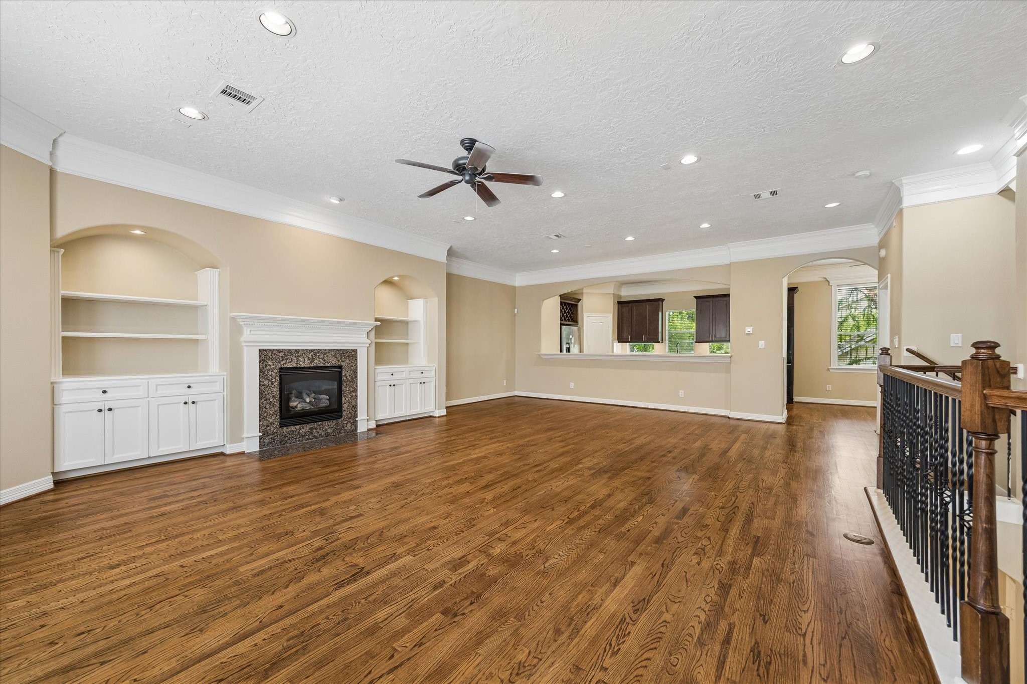 1417 Thompson Street Houston, TX 77007 - Photo 3 of 22 Second floor living space offers a gas fireplace and large windows for natural light
