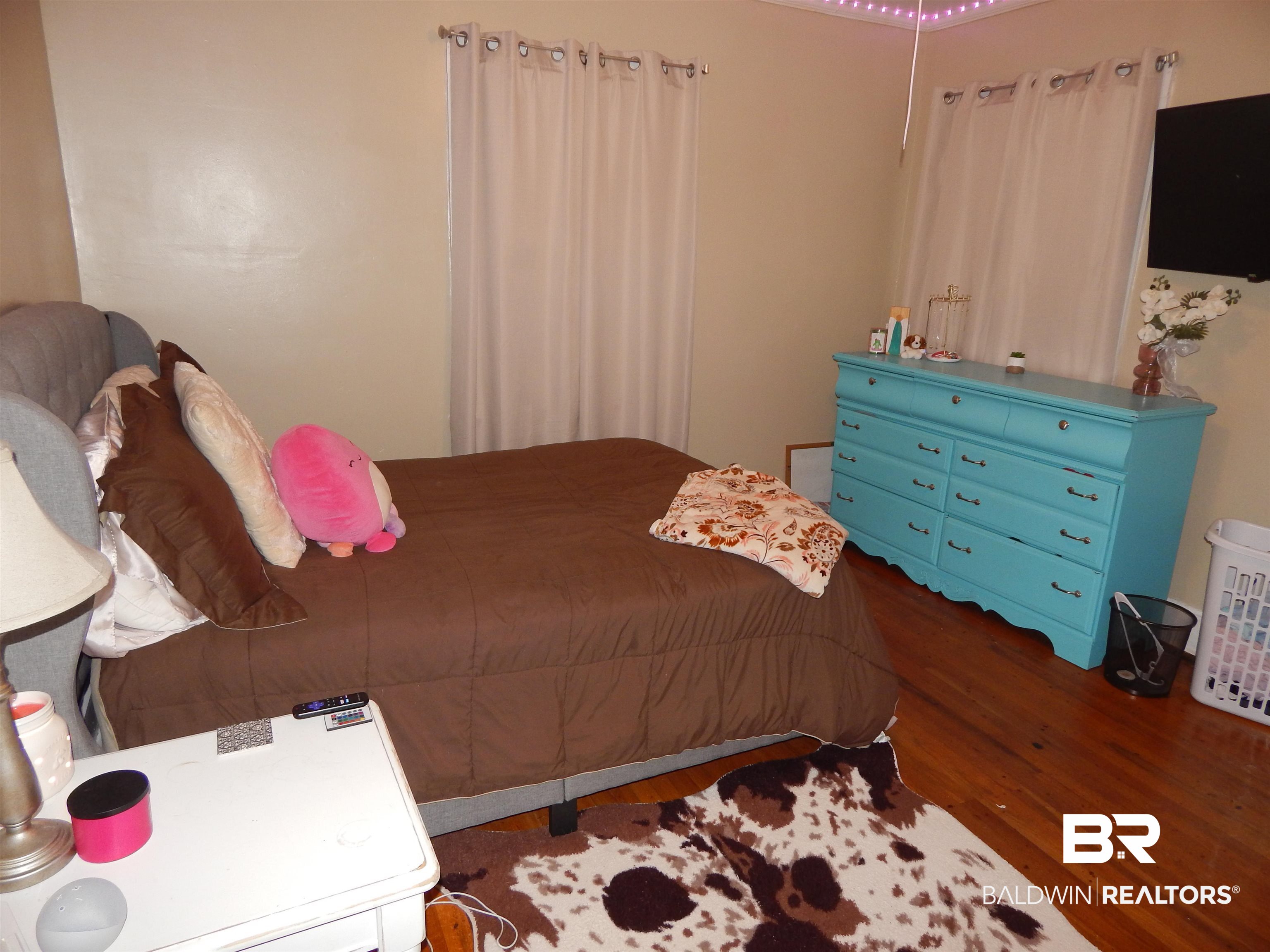 309 Bellview Avenue Evergreen, AL 36401 - Photo 15 of 27 Bedroom featuring wood finished floors