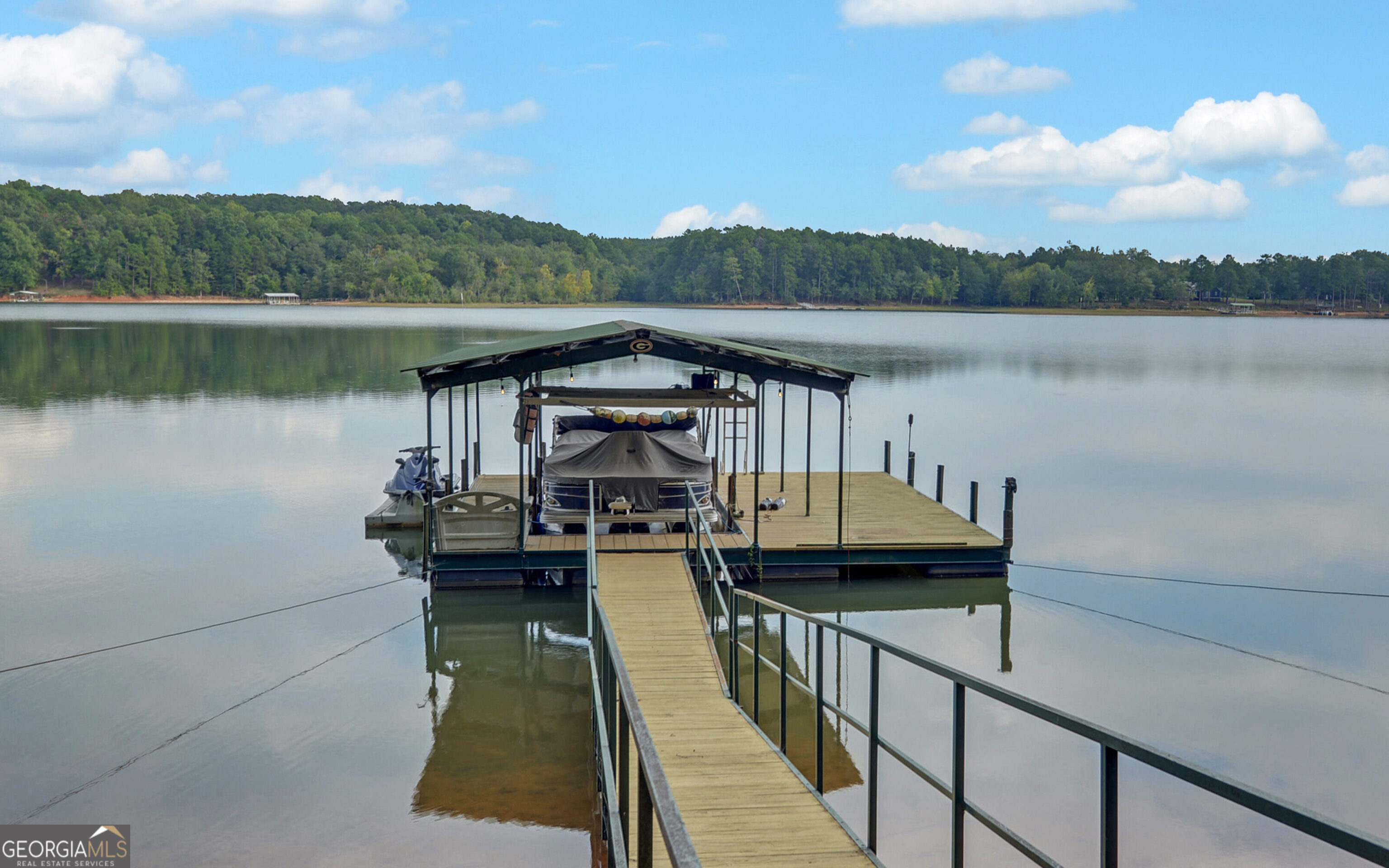 a view of a lake with a terrace