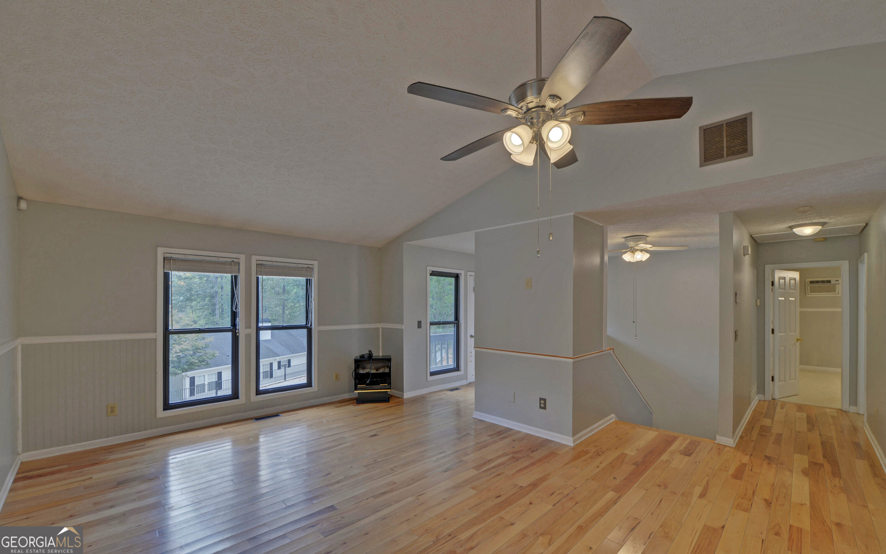 120 Ridgemore Circle Toccoa, GA 30577 - Photo 11 of 48 a view of empty room with wooden floor and fan