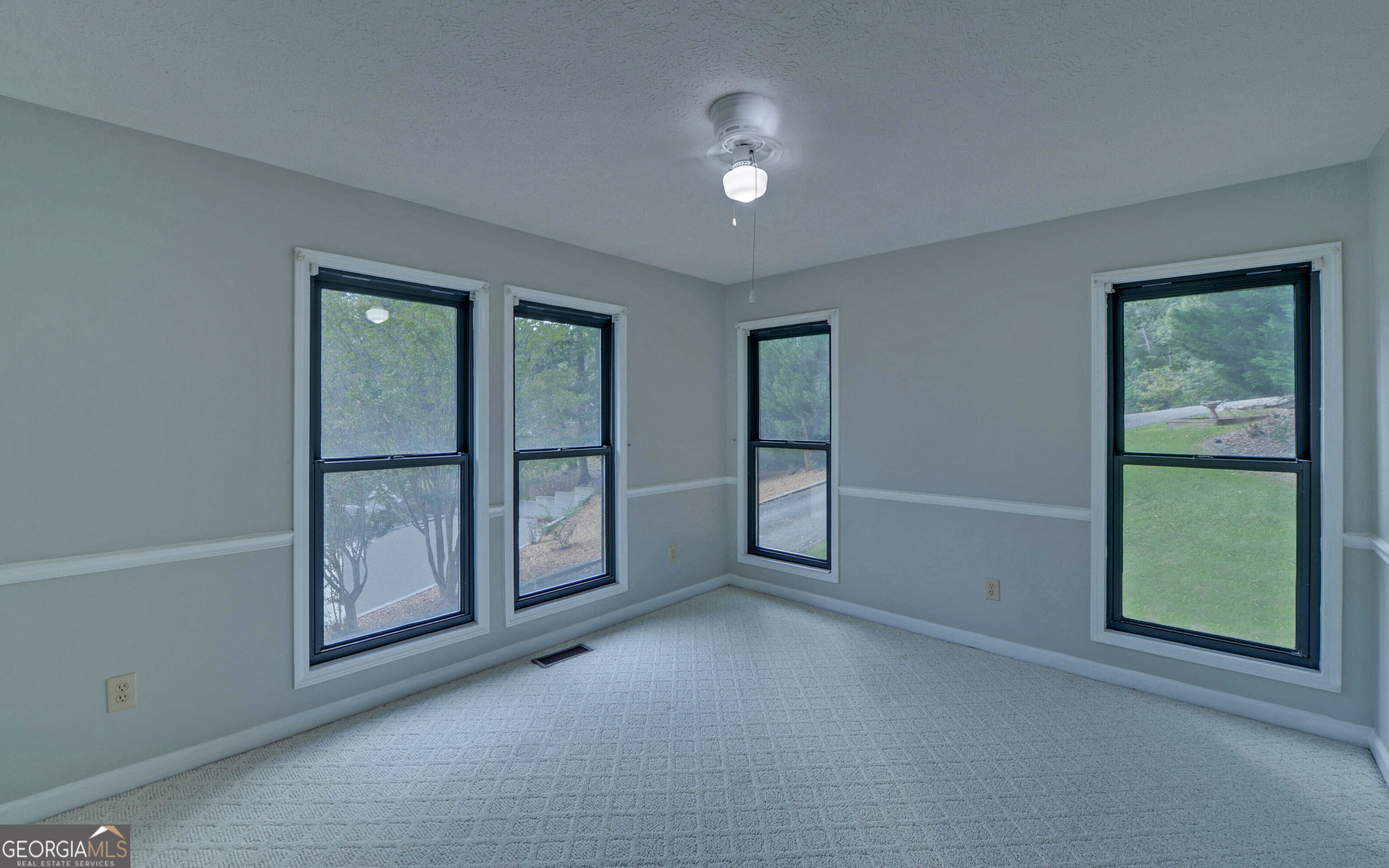 120 Ridgemore Circle Toccoa, GA 30577 - Photo 23 of 48 an empty room with windows and closet