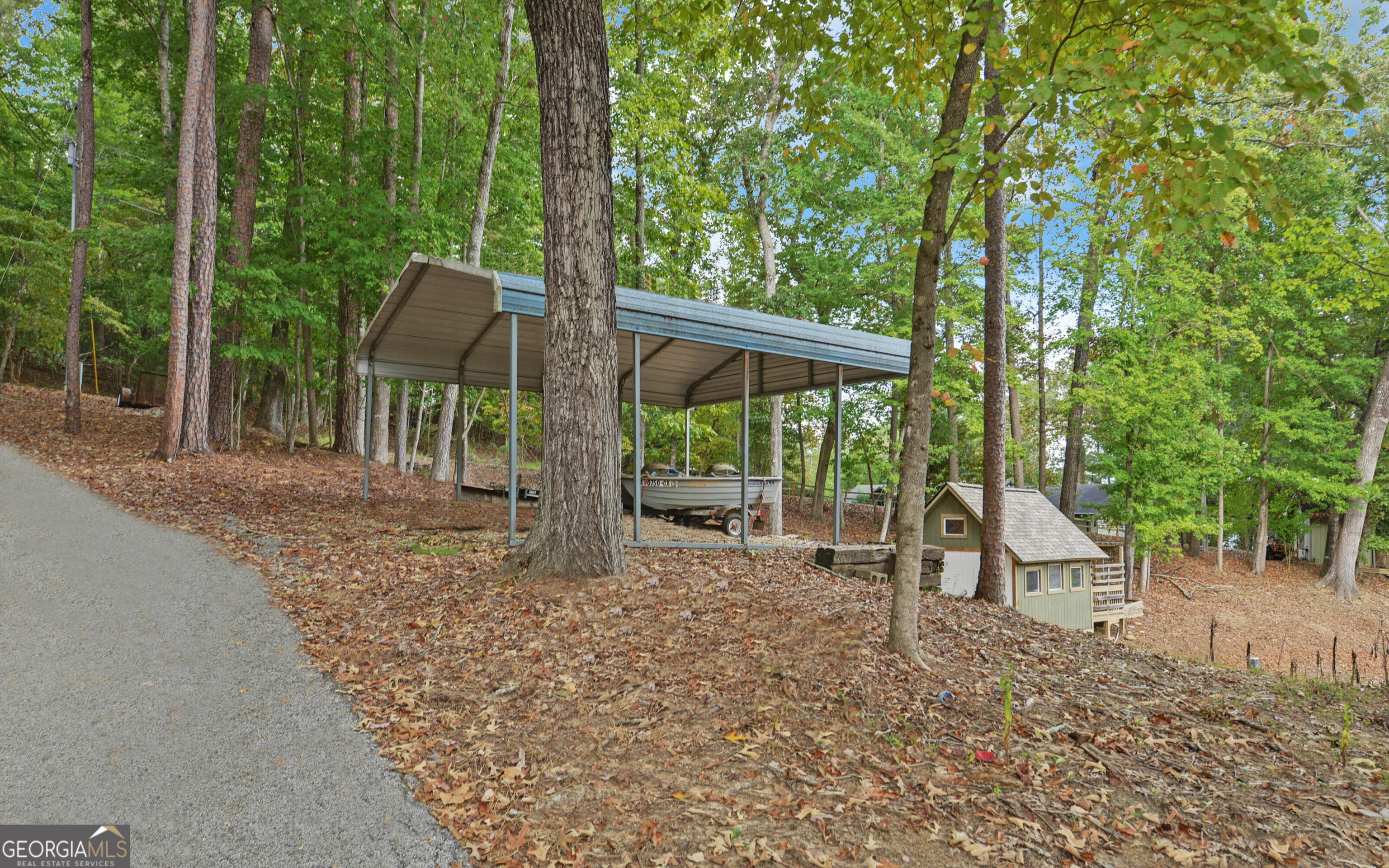 120 Ridgemore Circle Toccoa, GA 30577 - Photo 44 of 48 a backyard of a house with seating space
