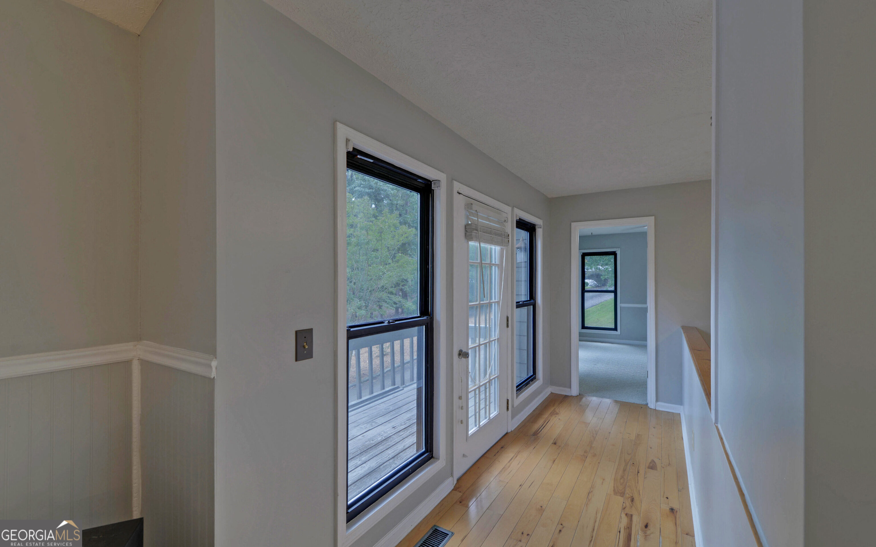 120 Ridgemore Circle Toccoa, GA 30577 - Photo 7 of 48 a view of a hallway with wooden floor and closet