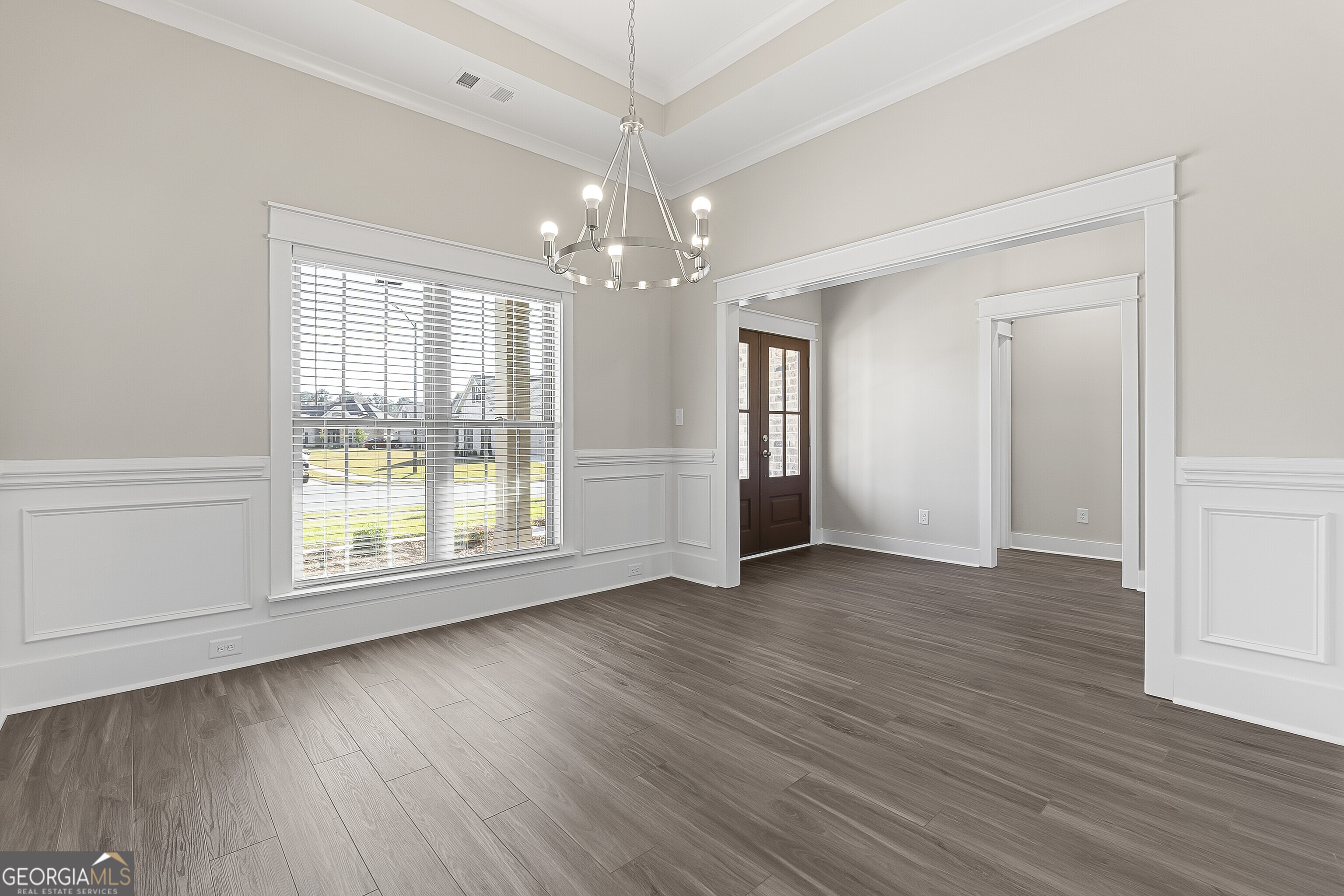 200 Emberwood Way Kathleen, GA 31047 - Photo 12 of 63 a view of an empty room with wooden floor and a window