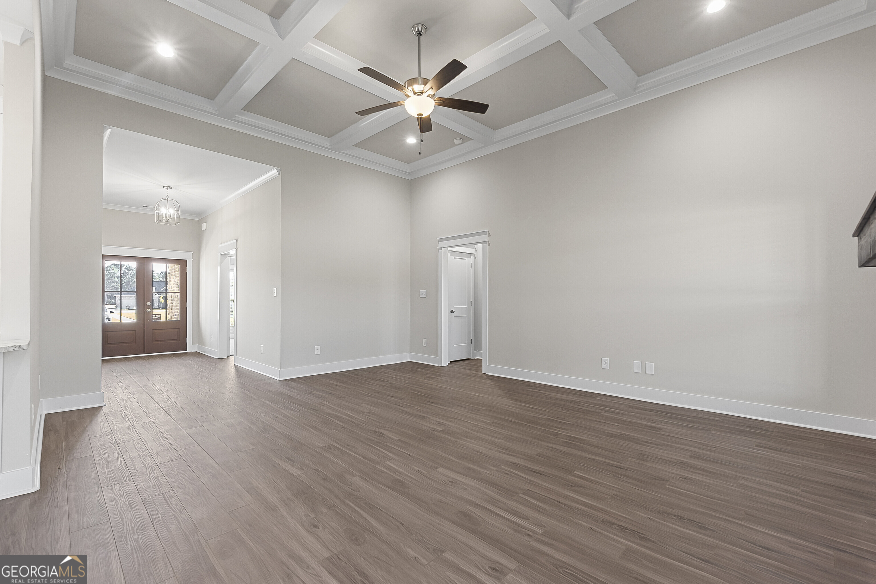 200 Emberwood Way Kathleen, GA 31047 - Photo 17 of 63 an empty room with wooden floor and ceiling fan