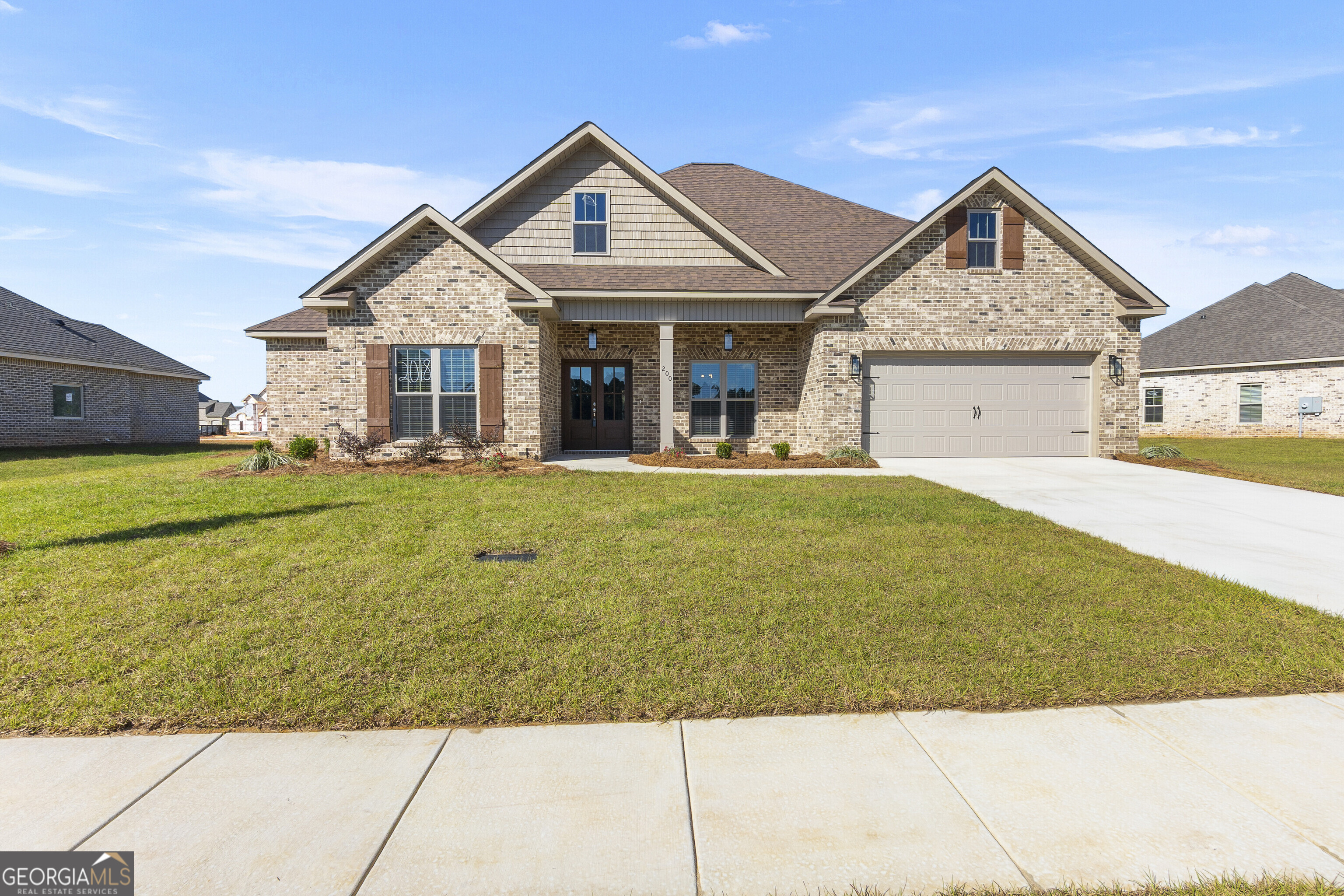 200 Emberwood Way Kathleen, GA 31047 - Photo 2 of 63 a front view of a house with a yard