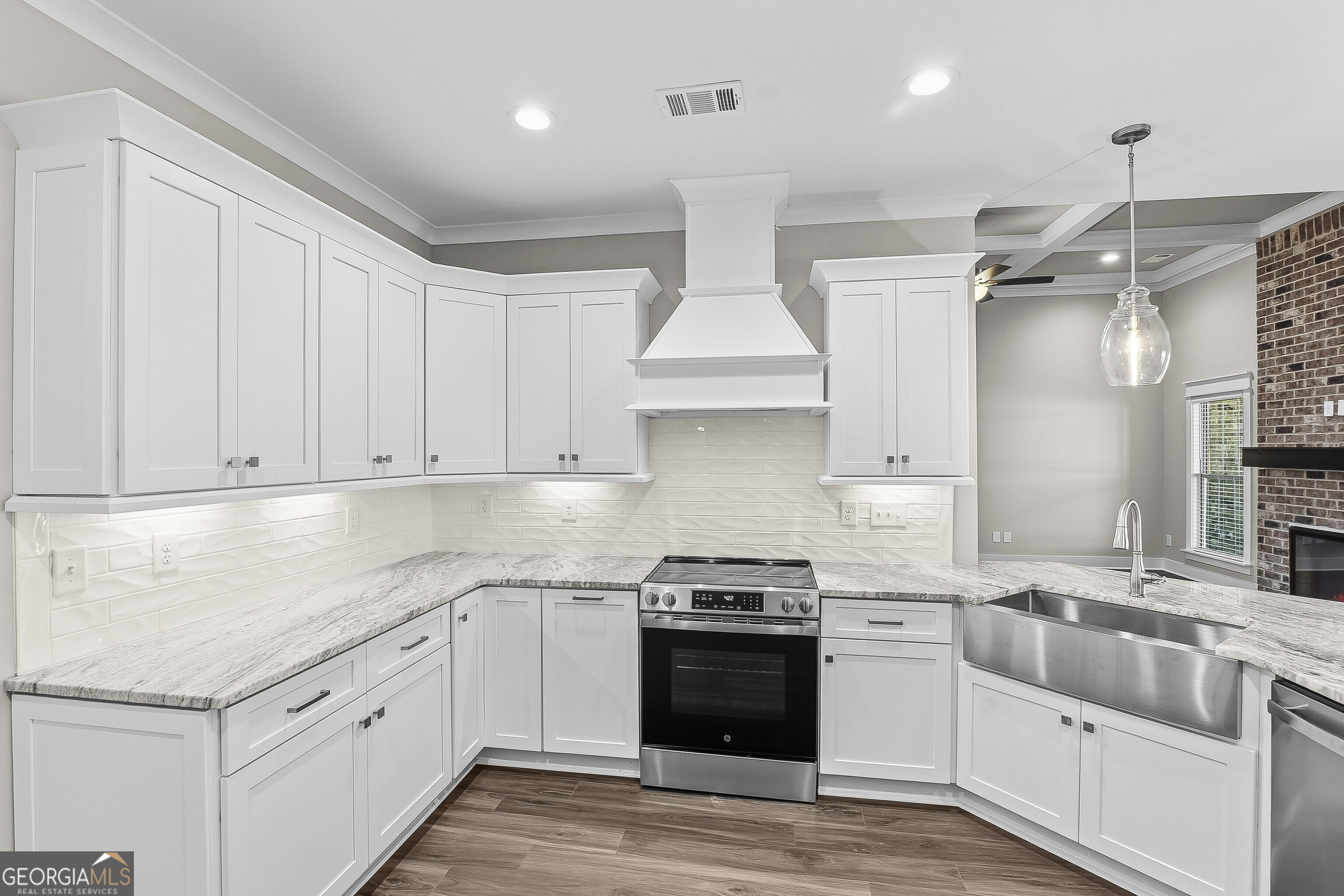 200 Emberwood Way Kathleen, GA 31047 - Photo 27 of 63 a kitchen with stainless steel appliances granite countertop a sink and cabinets