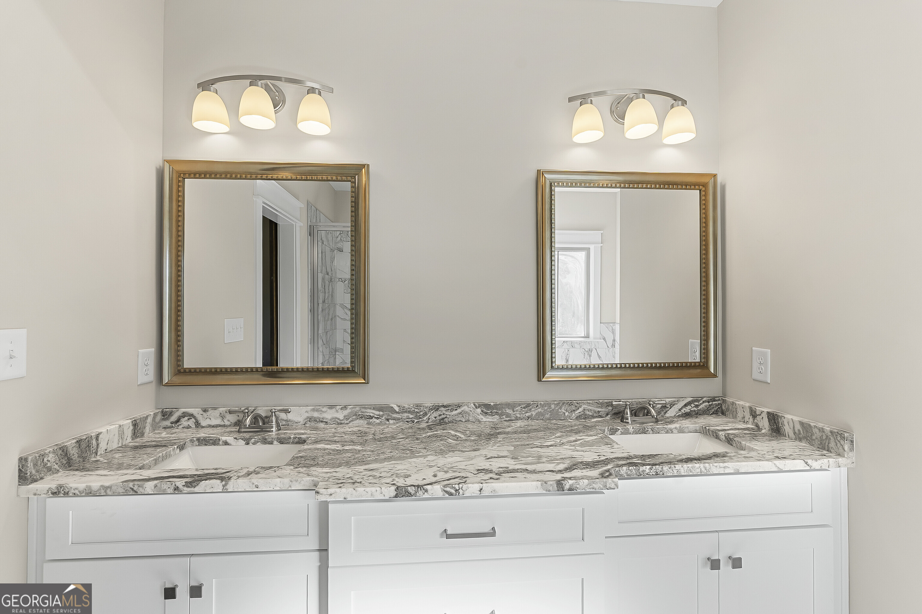 200 Emberwood Way Kathleen, GA 31047 - Photo 37 of 63 a bathroom with a sink vanity and mirror