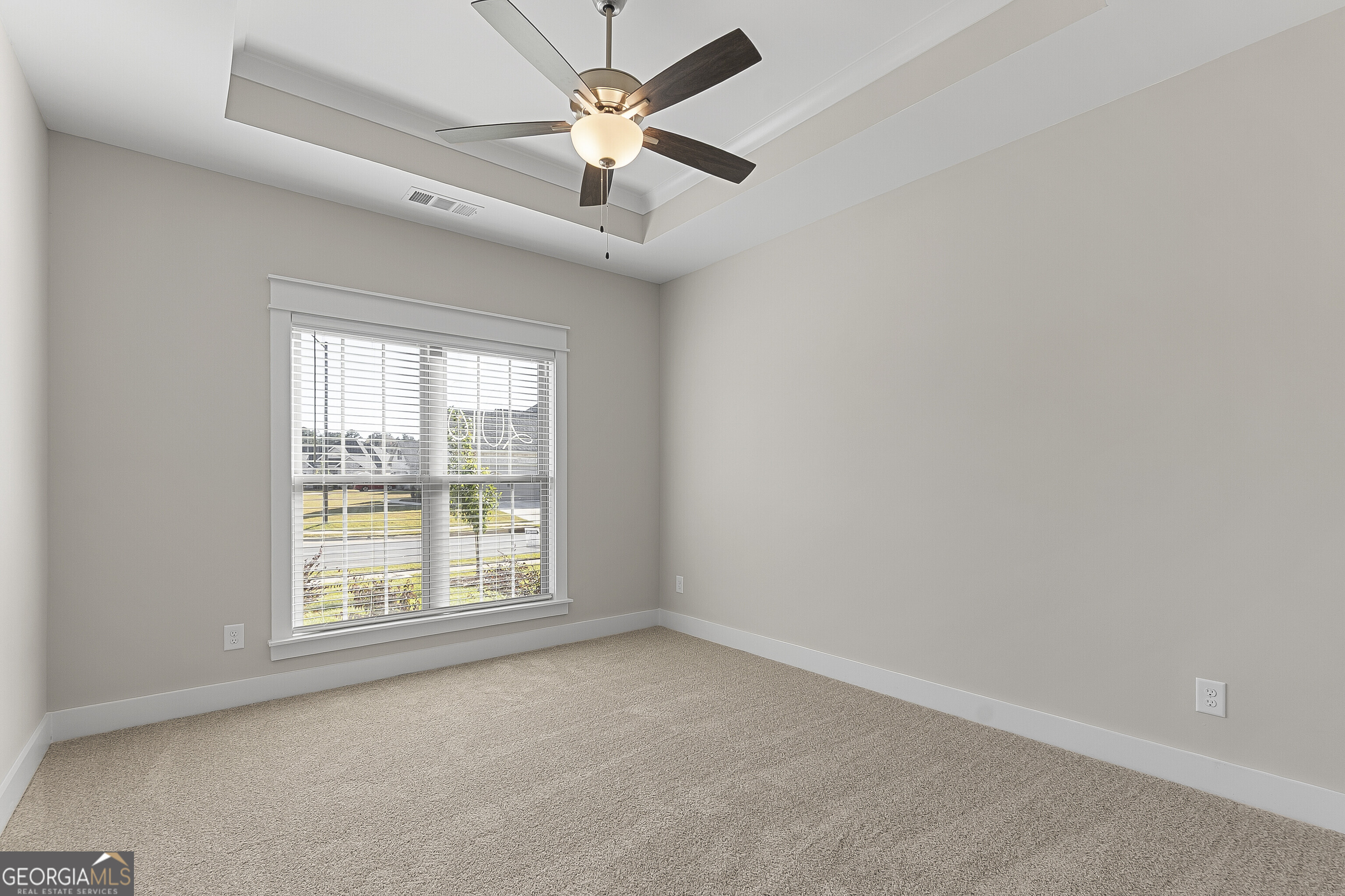 200 Emberwood Way Kathleen, GA 31047 - Photo 41 of 63 an empty room with windows and fan