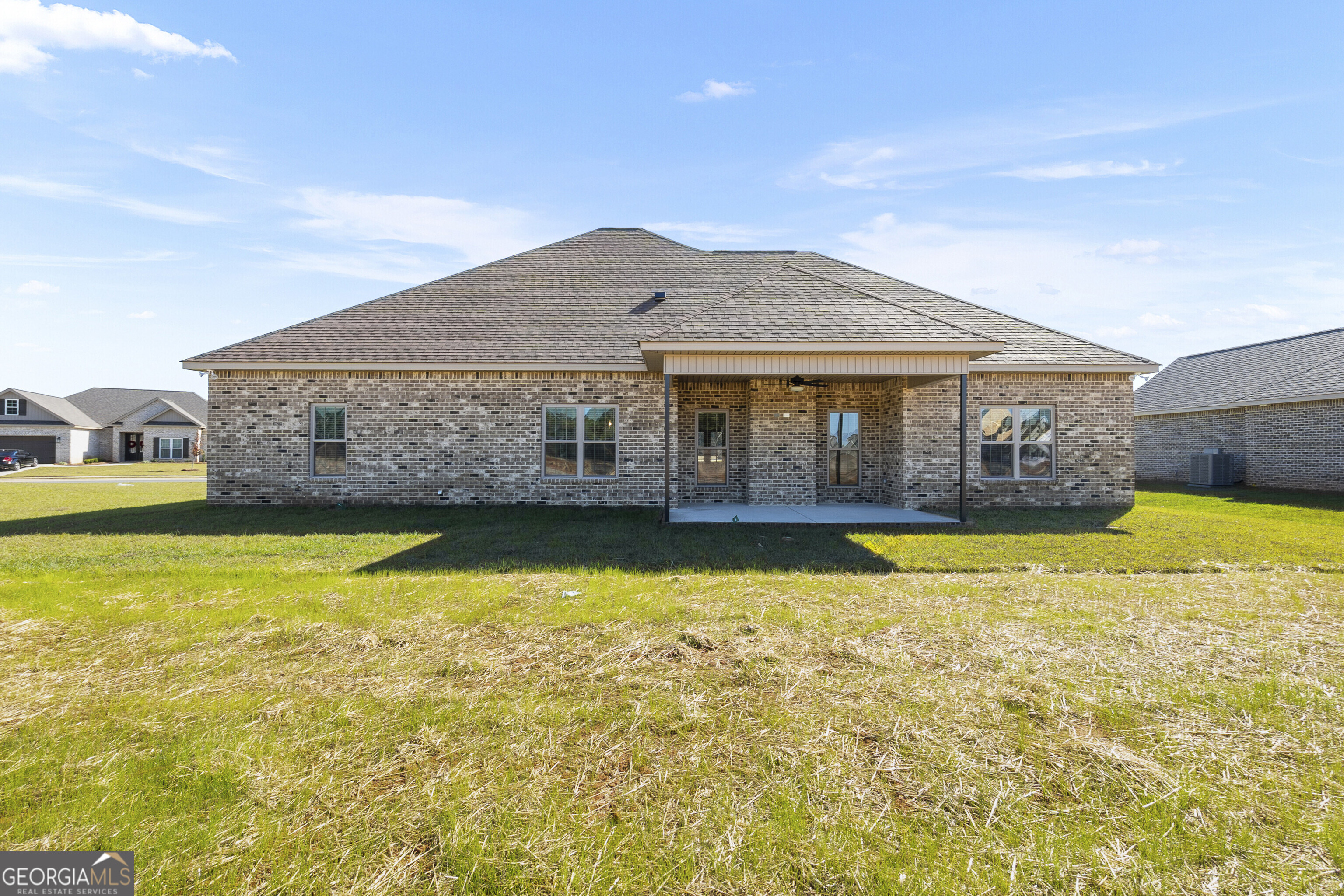 200 Emberwood Way Kathleen, GA 31047 - Photo 54 of 63 a front view of a house with swimming pool