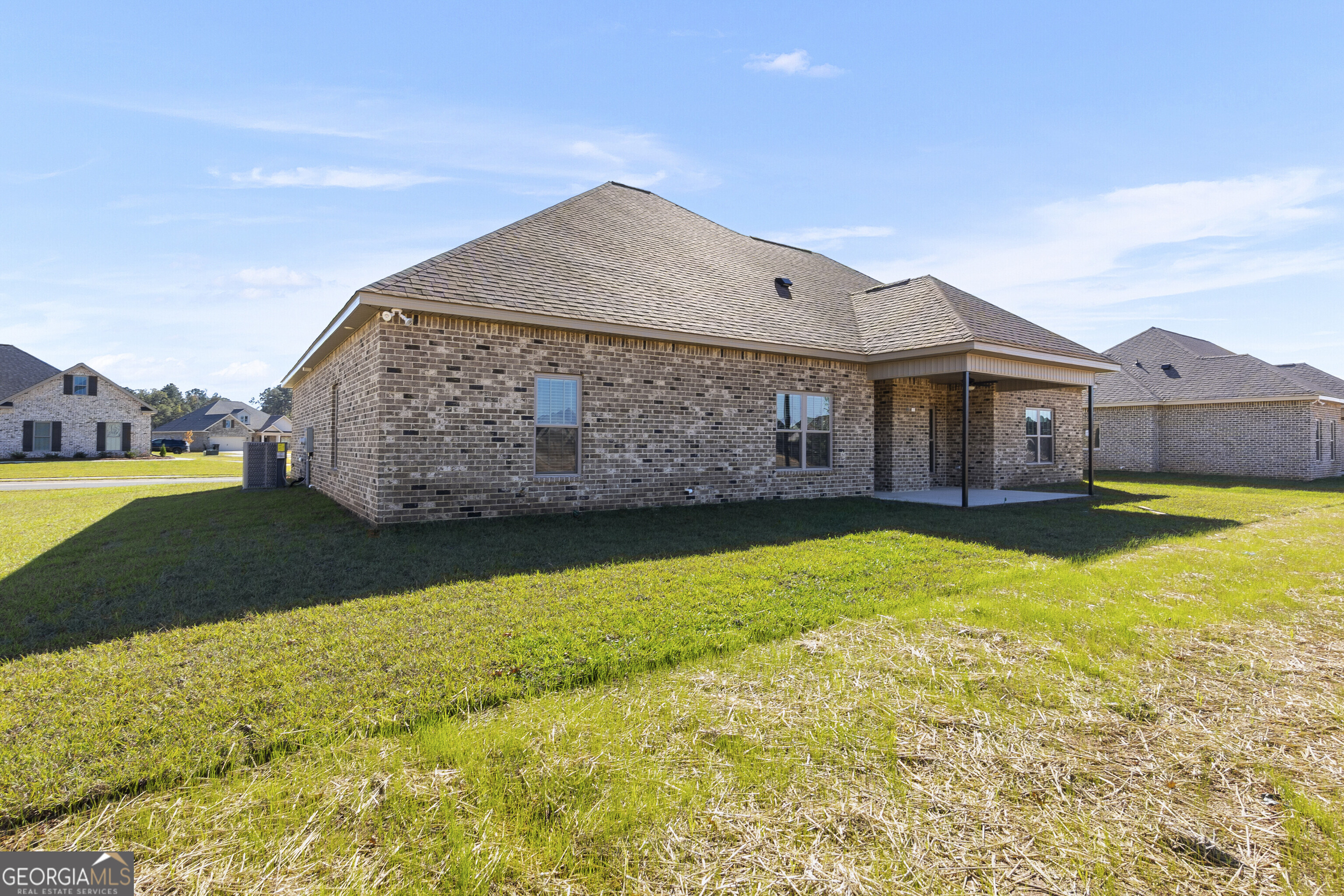 200 Emberwood Way Kathleen, GA 31047 - Photo 60 of 63 a view of a house with a swimming pool