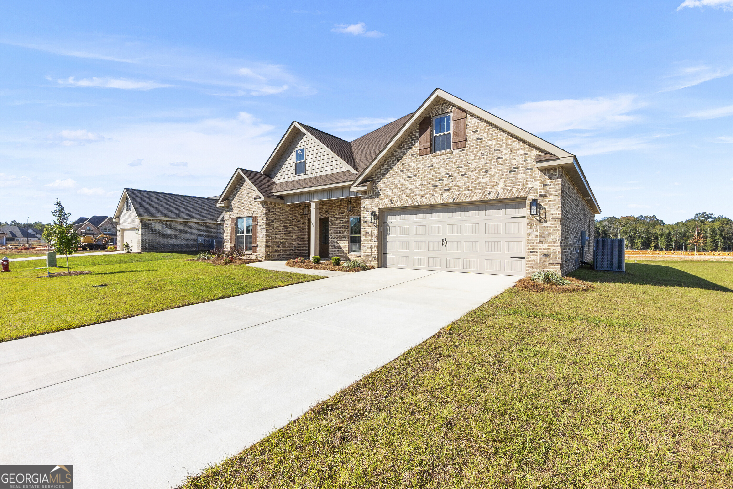 200 Emberwood Way Kathleen, GA 31047 - Photo 6 of 63 a view of an house with backyard and road