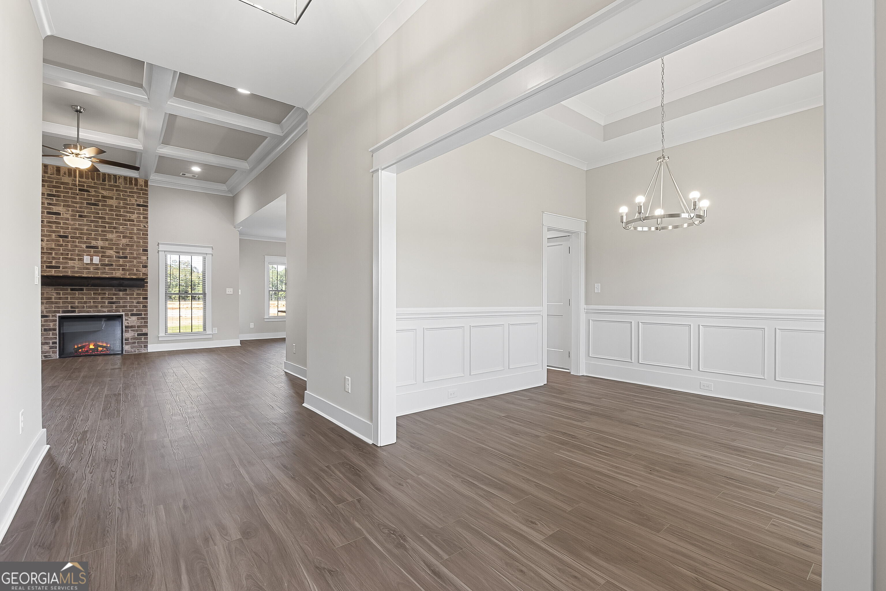 200 Emberwood Way Kathleen, GA 31047 - Photo 8 of 63 a view of a livingroom with wooden floor fireplace and window