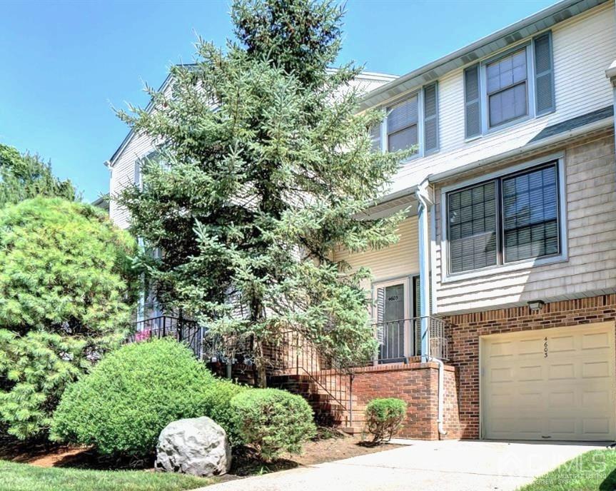 4603 Stonehedge Road Edison, NJ 08820 - Photo 2 of 35 a front view of a house with a yard