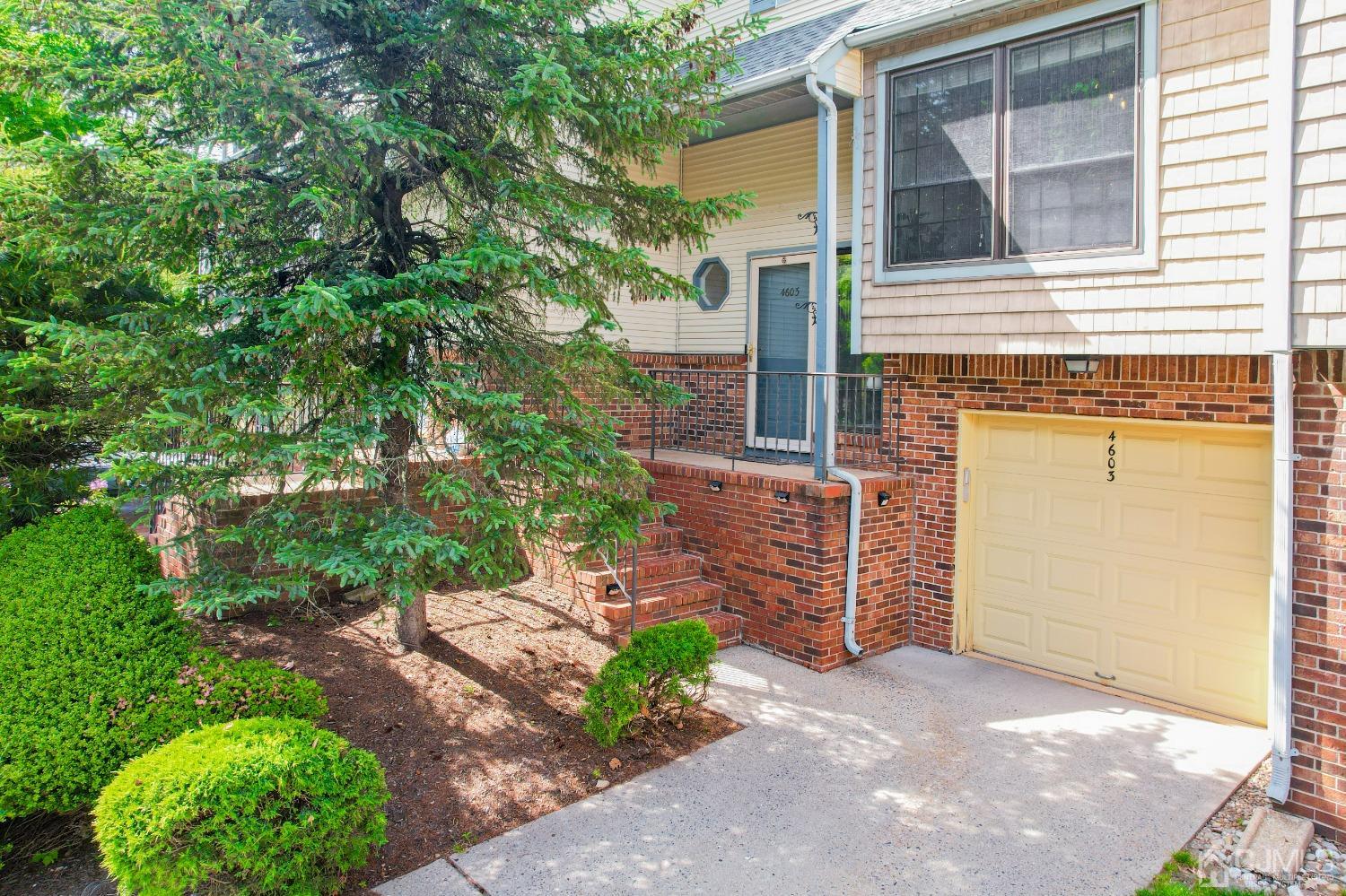 4603 Stonehedge Road Edison, NJ 08820 - Photo 3 of 35 a front view of a house with a yard