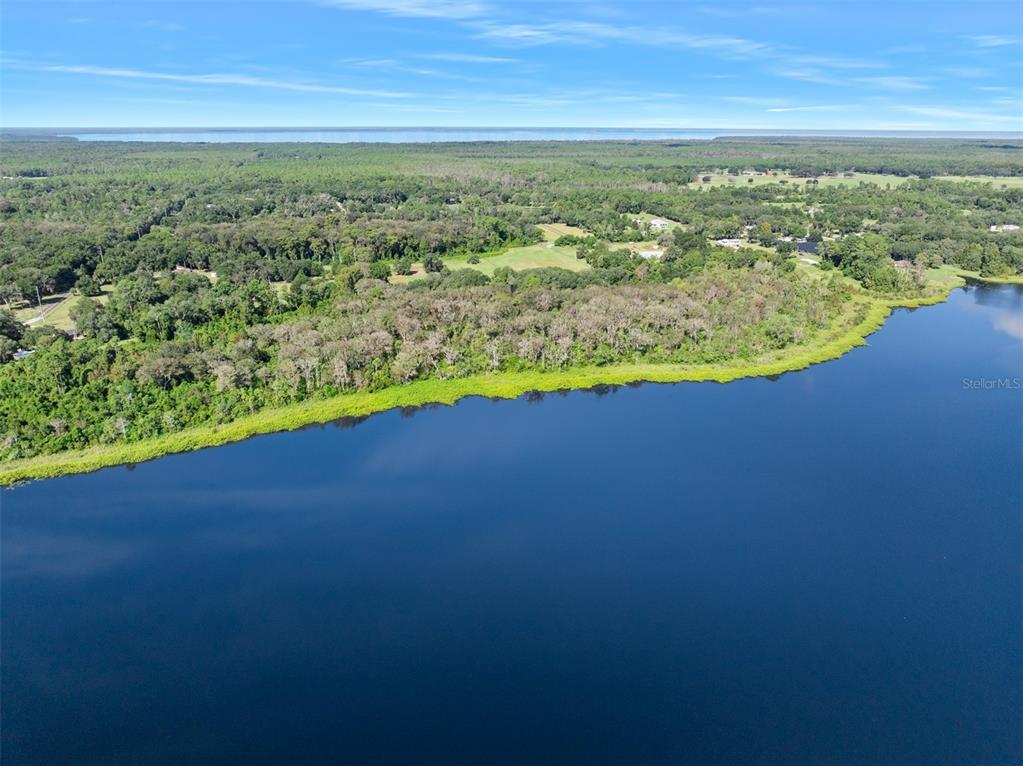 Roberts Road Pierson, FL 32180 - Photo 12 of 36 a view of a lake with a mountain