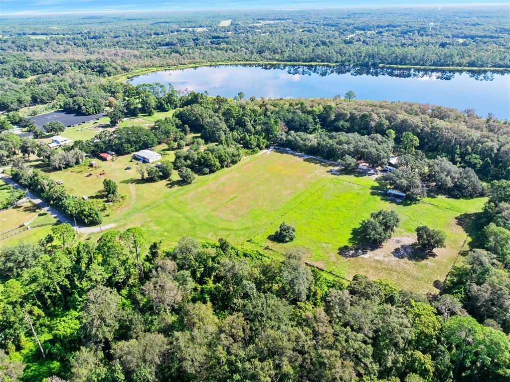Roberts Road Pierson, FL 32180 - Photo 8 of 36 an aerial view of ocean residential house with swimming pool and green space