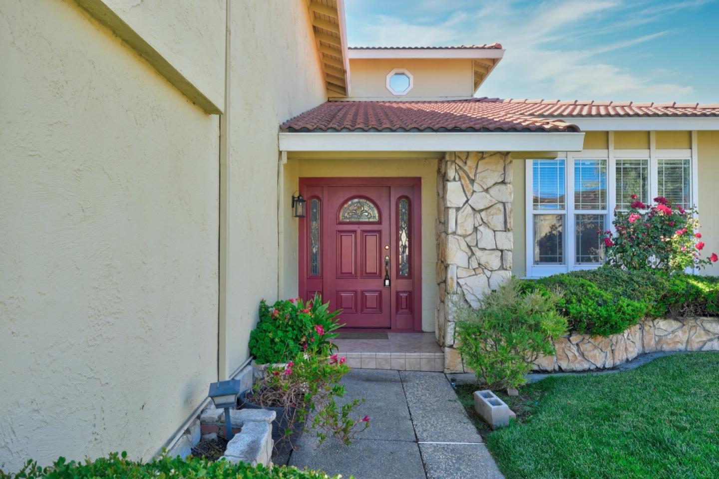 2321 Oak Flat Road San Jose, CA 95131 - Photo 3 of 43 a front view of a house with garden