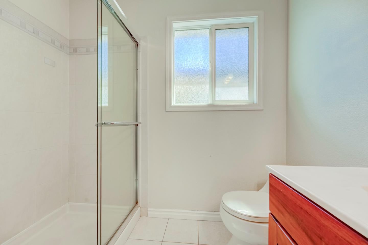 2321 Oak Flat Road San Jose, CA 95131 - Photo 31 of 43 a bathroom with a toilet and a shower