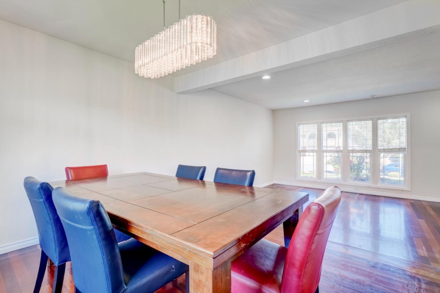 2321 Oak Flat Road San Jose, CA 95131 - Photo 10 of 43 a view of a dining room with furniture window and wooden floor