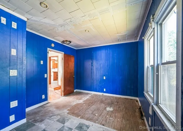 a view of an empty room and window