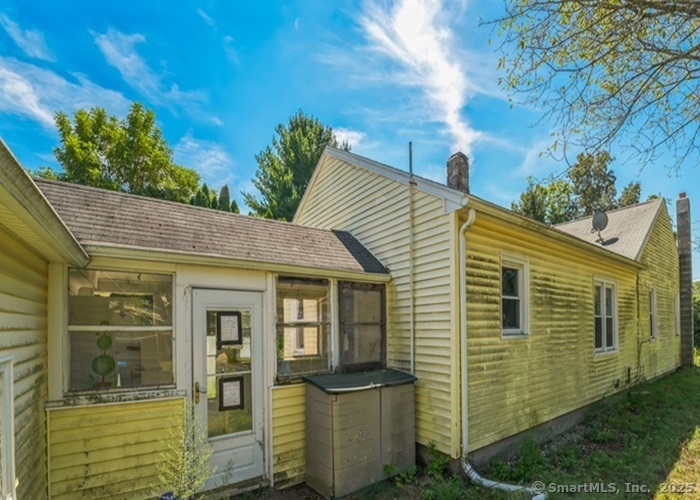 416 Hanover Road Scotland, CT 06330 - Photo 3 of 20 a view of a house with brick walls
