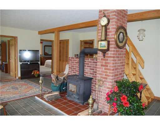 276 Ridge Road Monmouth, ME 04259 - Photo 6 of 21 Other. woodstove & stairs to office up