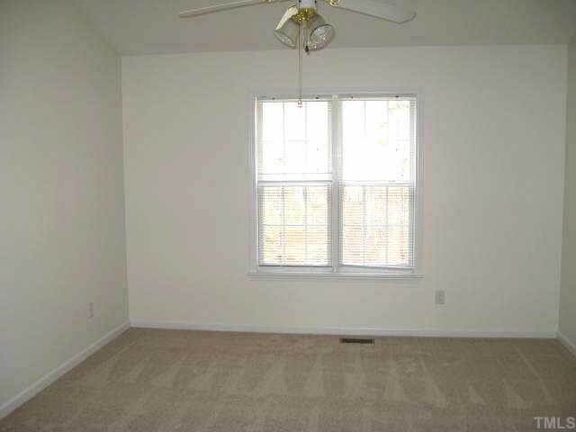 Grand master suite with cathedral ceiling & walk-in closet