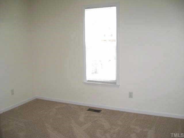 3132 Eric Street Willow Spring, NC 27592 - Photo 8 of 12 Second bedroom with large closet