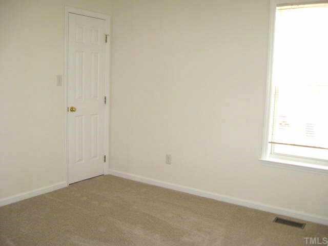 3132 Eric Street Willow Spring, NC 27592 - Photo 10 of 12 Third bedroom with walk-in closet