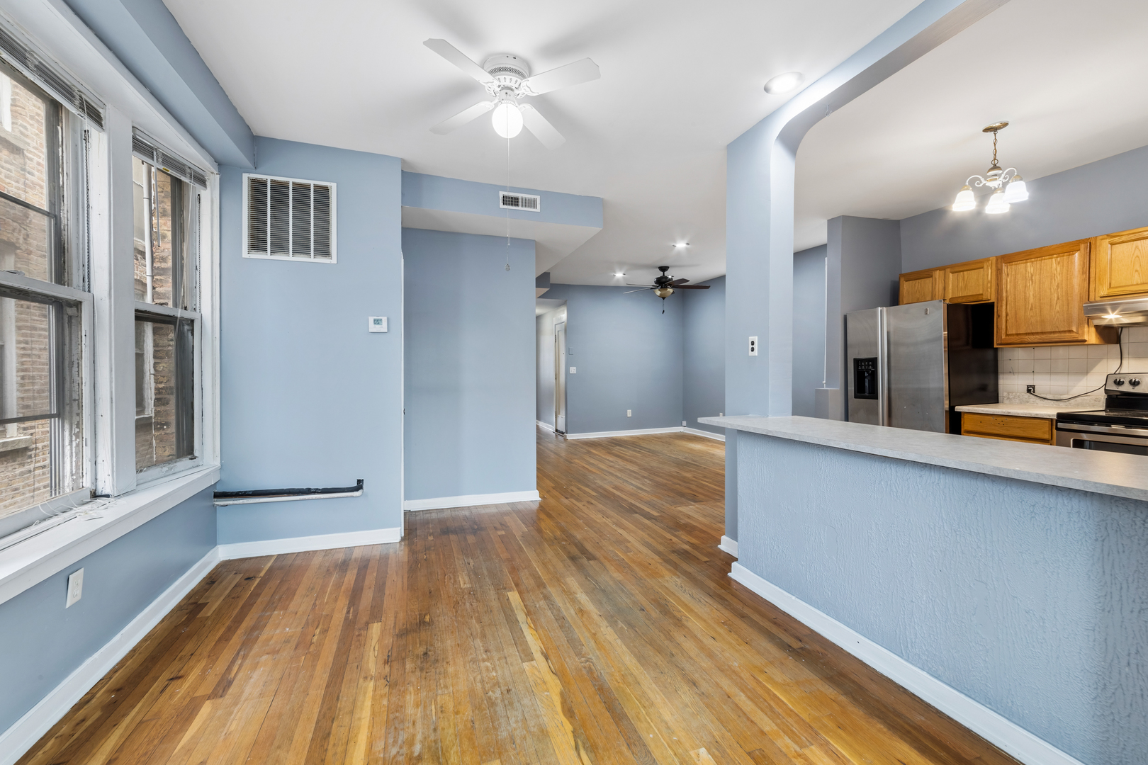 4434 North Drake Avenue, Unit 1 Chicago, IL 60625 - Photo 4 of 11 a view of a kitchen from the windows