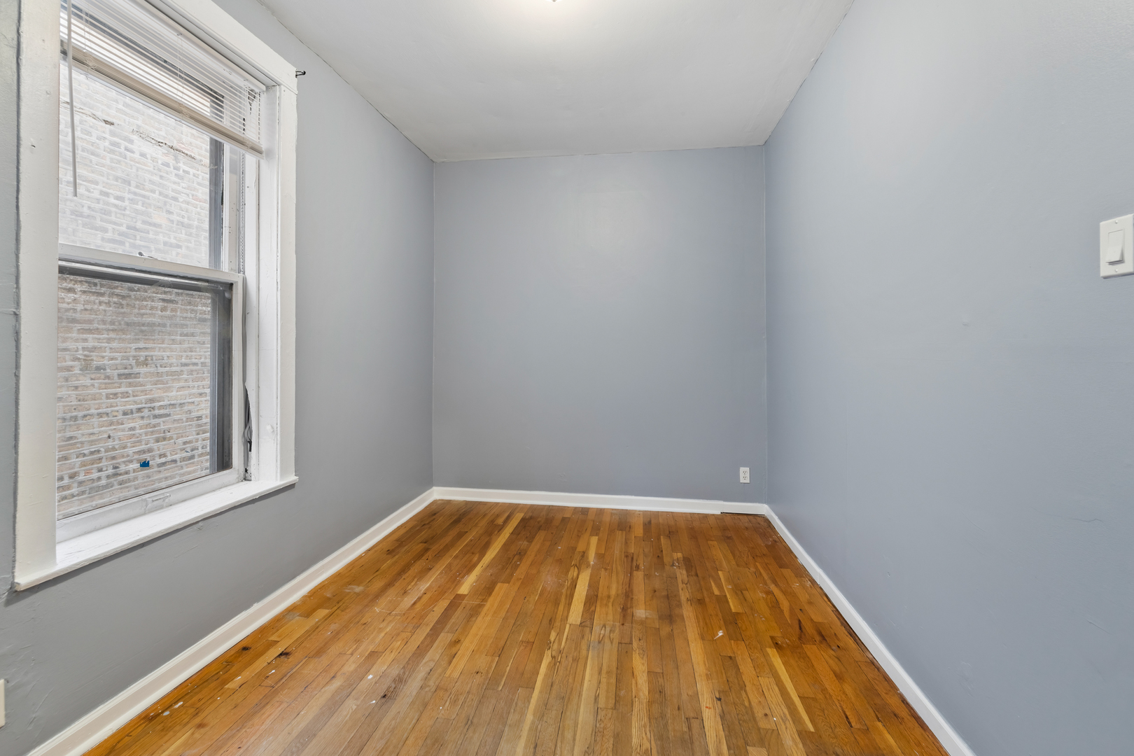 4434 North Drake Avenue, Unit 1 Chicago, IL 60625 - Photo 7 of 11 a view of wooden floor in a room