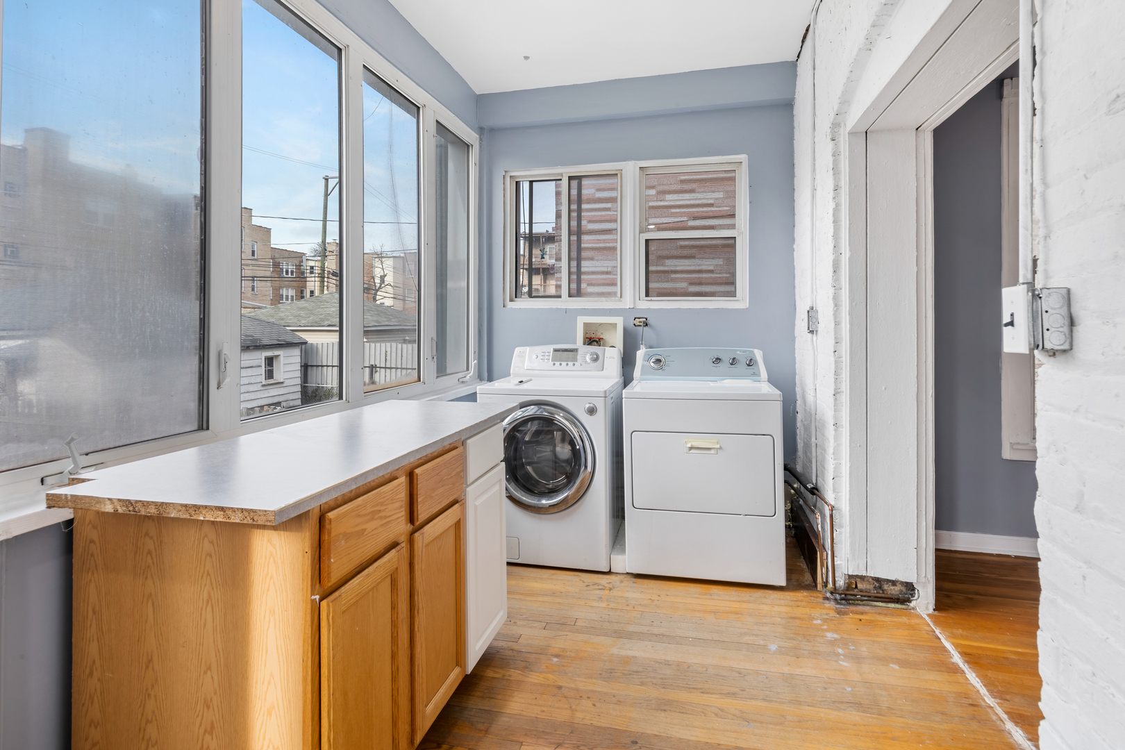 4434 North Drake Avenue, Unit 1 Chicago, IL 60625 - Photo 9 of 11 a utility room with dryer and washer