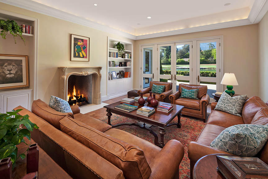 511 Las Fuentes Drive Santa Barbara, CA 93108 - Photo 5 of 11 a living room with furniture large window and a fireplace