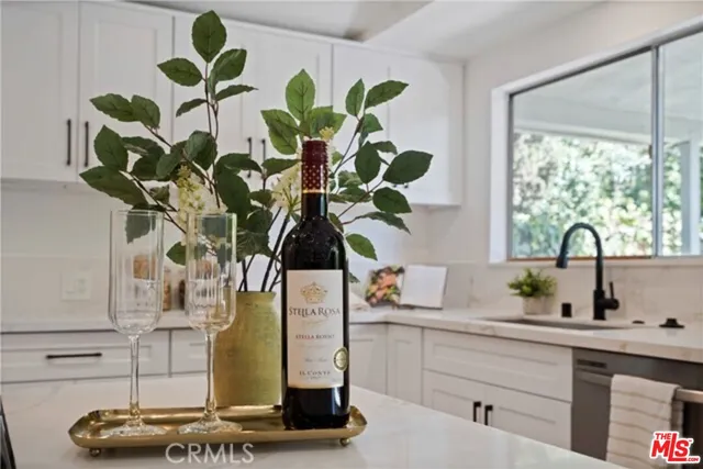 a vase of flowers sitting on a table