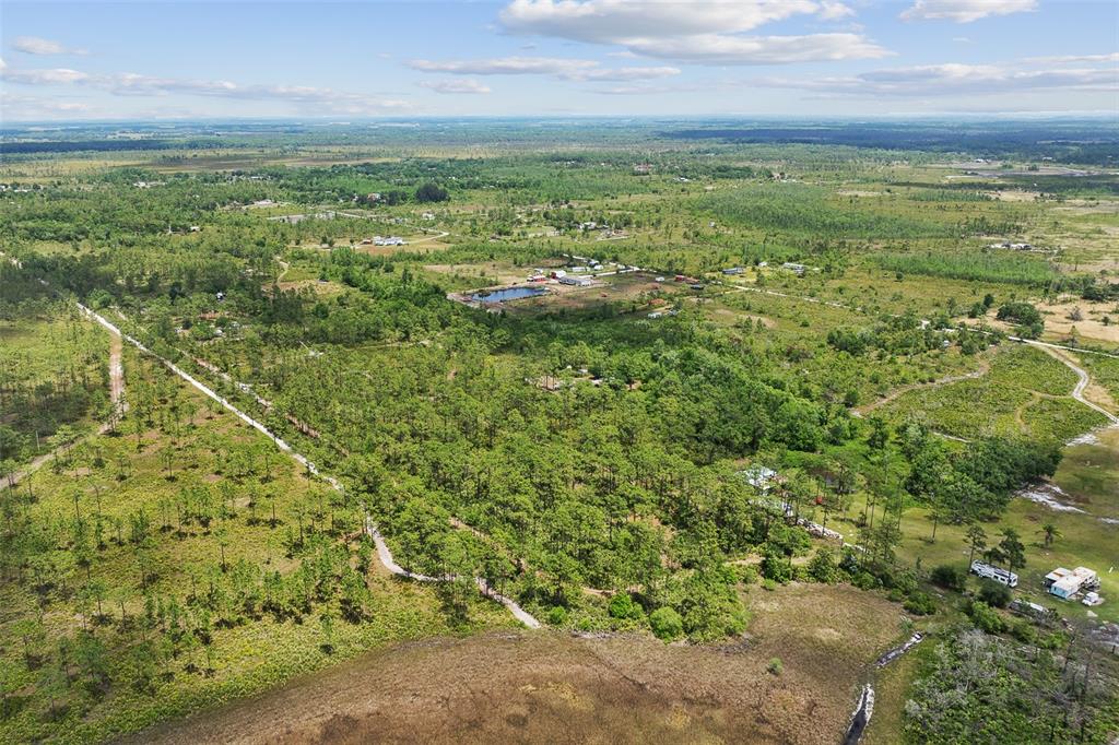 0 Palm Frond Road St. Cloud, FL 34773 - Photo 7 of 12 a view of a field with an outdoor space