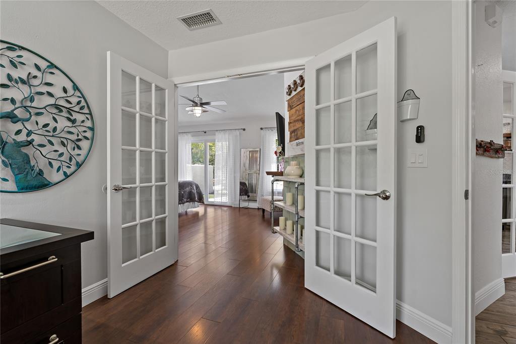 808 Rustic Oaks Drive Palm Harbor, FL 34684 - Photo 21 of 55 a view of entryway with wooden floor and stairs