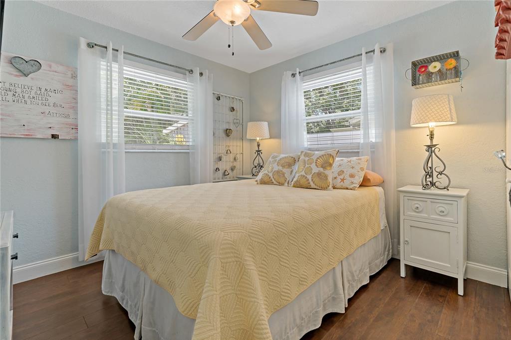 808 Rustic Oaks Drive Palm Harbor, FL 34684 - Photo 35 of 55 a bedroom with a bed and a dresser