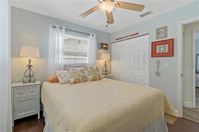 a view of a swimming pool with chairs in patio