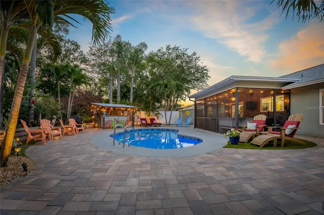 a outdoor living space with patio furniture and a potted plants