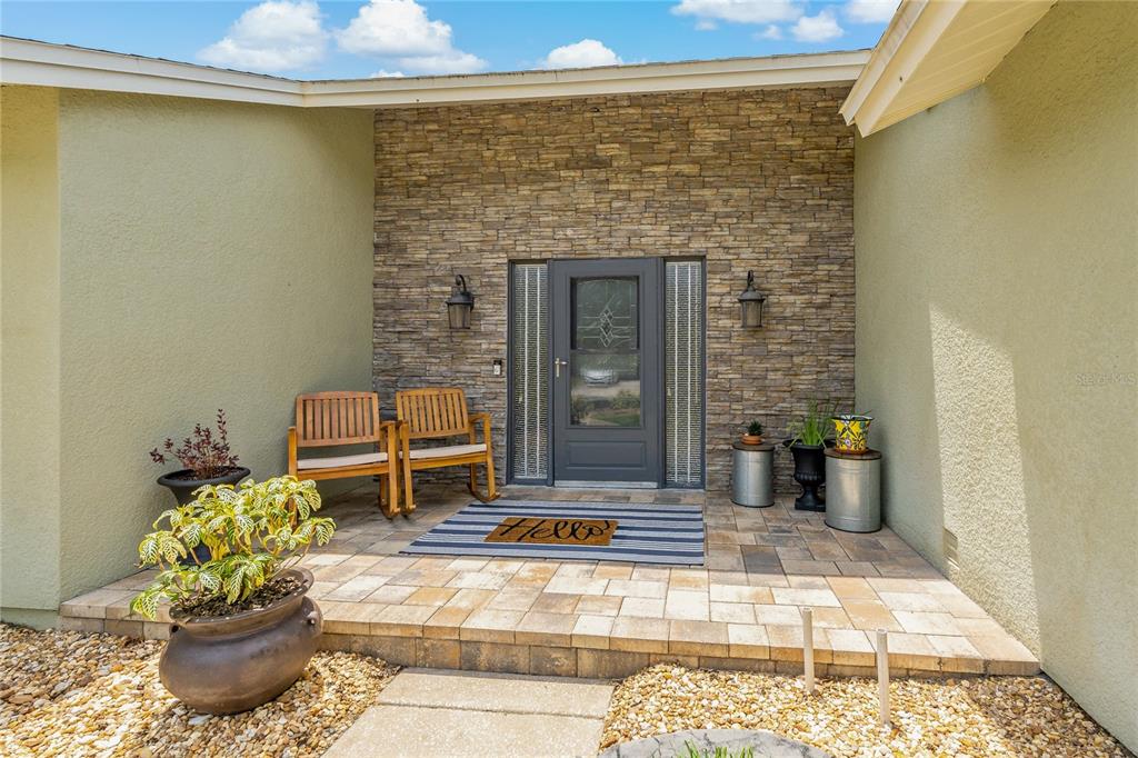 808 Rustic Oaks Drive Palm Harbor, FL 34684 - Photo 9 of 55 a living room with furniture