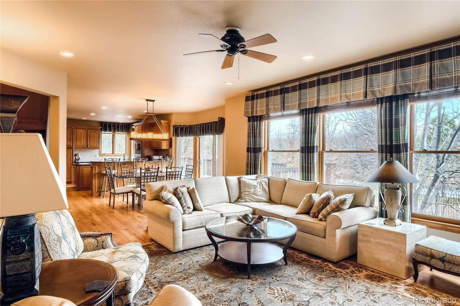 3935 Pierson Street Wheat Ridge, CO 80033 - Photo 11 of 40 a living room with furniture and a large window