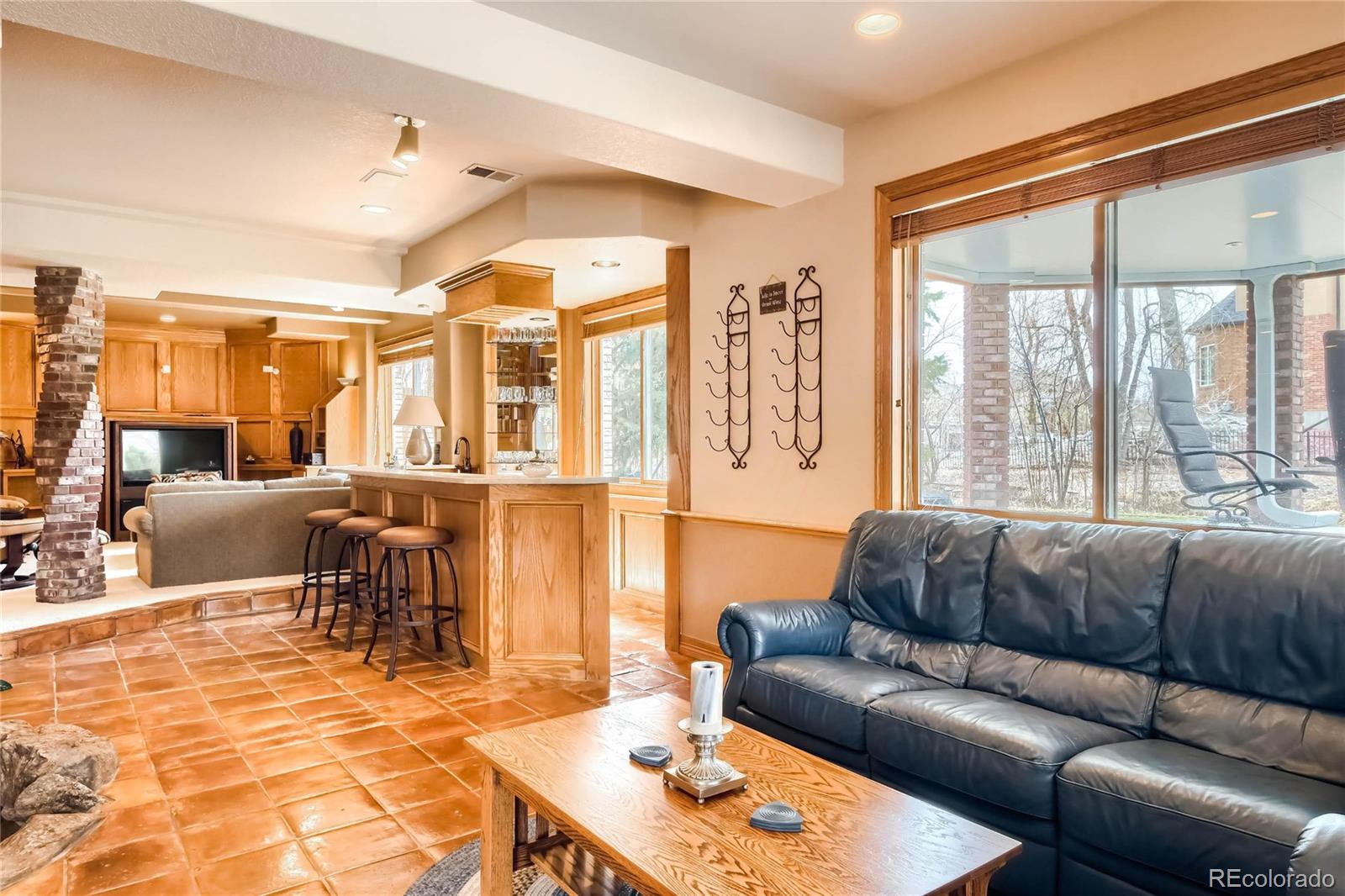 3935 Pierson Street Wheat Ridge, CO 80033 - Photo 26 of 40 a living room with furniture and a large window