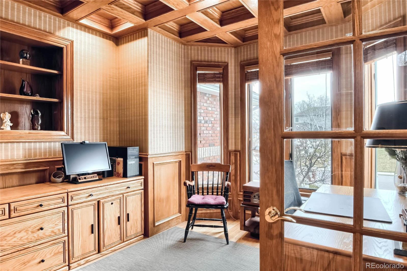 3935 Pierson Street Wheat Ridge, CO 80033 - Photo 4 of 40 a bedroom with furniture and a window